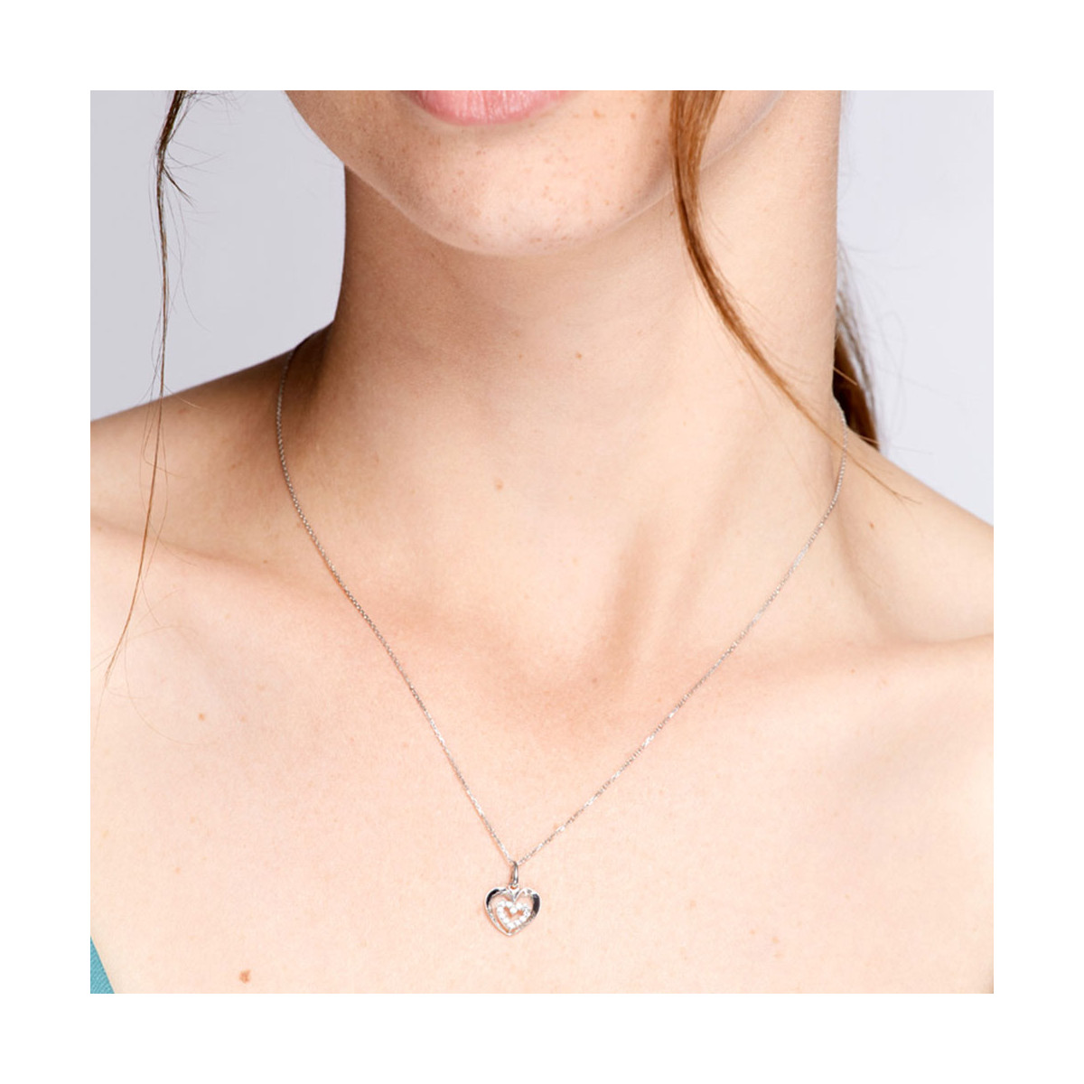 Pendentif Or blanc 375/1000 et zirconium Pendentif Or blanc 375/1000 et zirconium