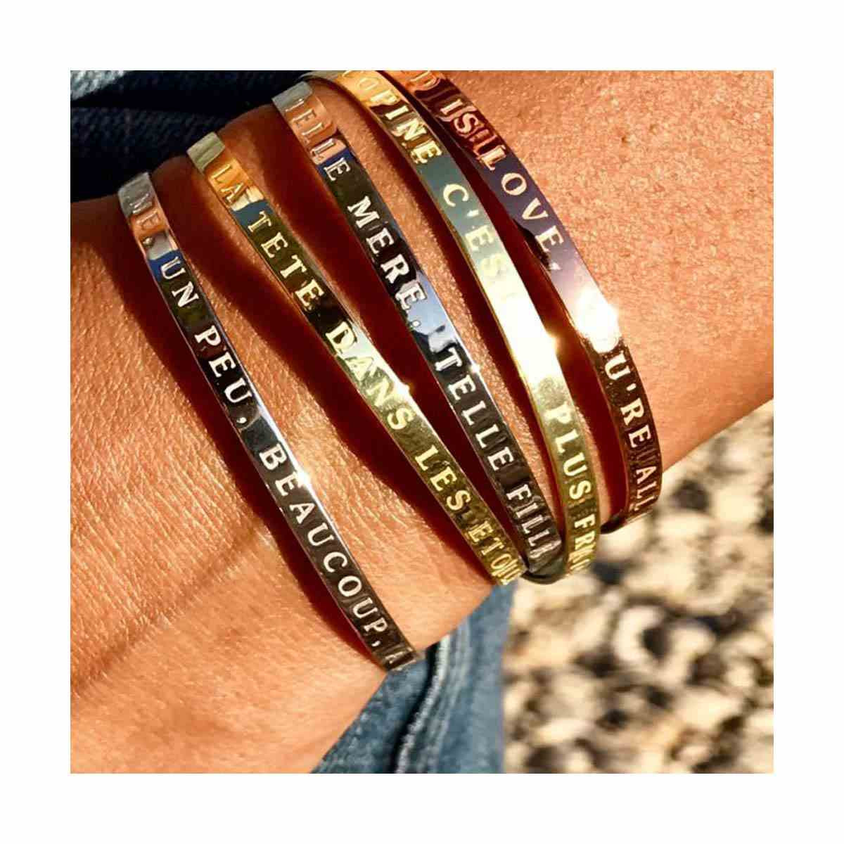 "FEMME D'INFLUENCE" bracelet jonc argenté à message