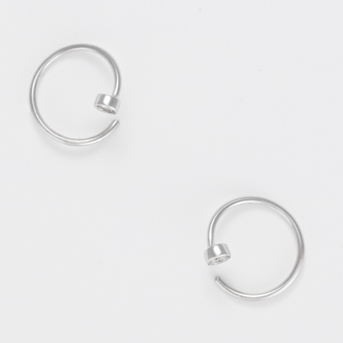 Boucles d'oreilles Or Blanc et Diamant Boucles d'oreilles "Joli tourbillon solo" Or Blanc et Diamant
