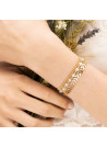 Bracelet doré et pierre de lune