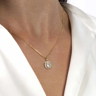 Pendentif Or jaune 375/1000 et zirconi...